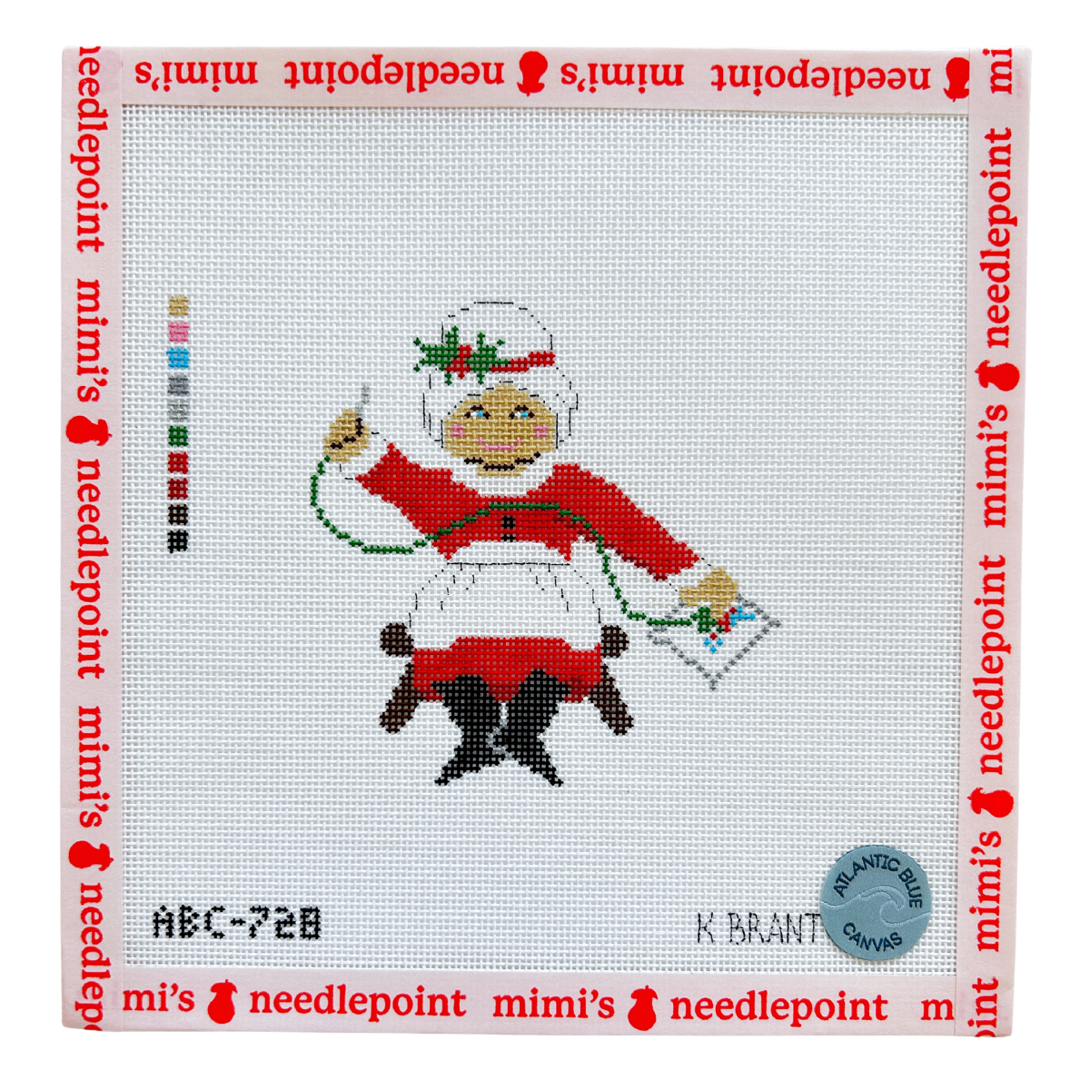 Needlepointing Mrs. Claus